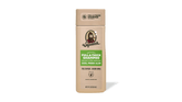 Shampoo bottle with a green label on a green background