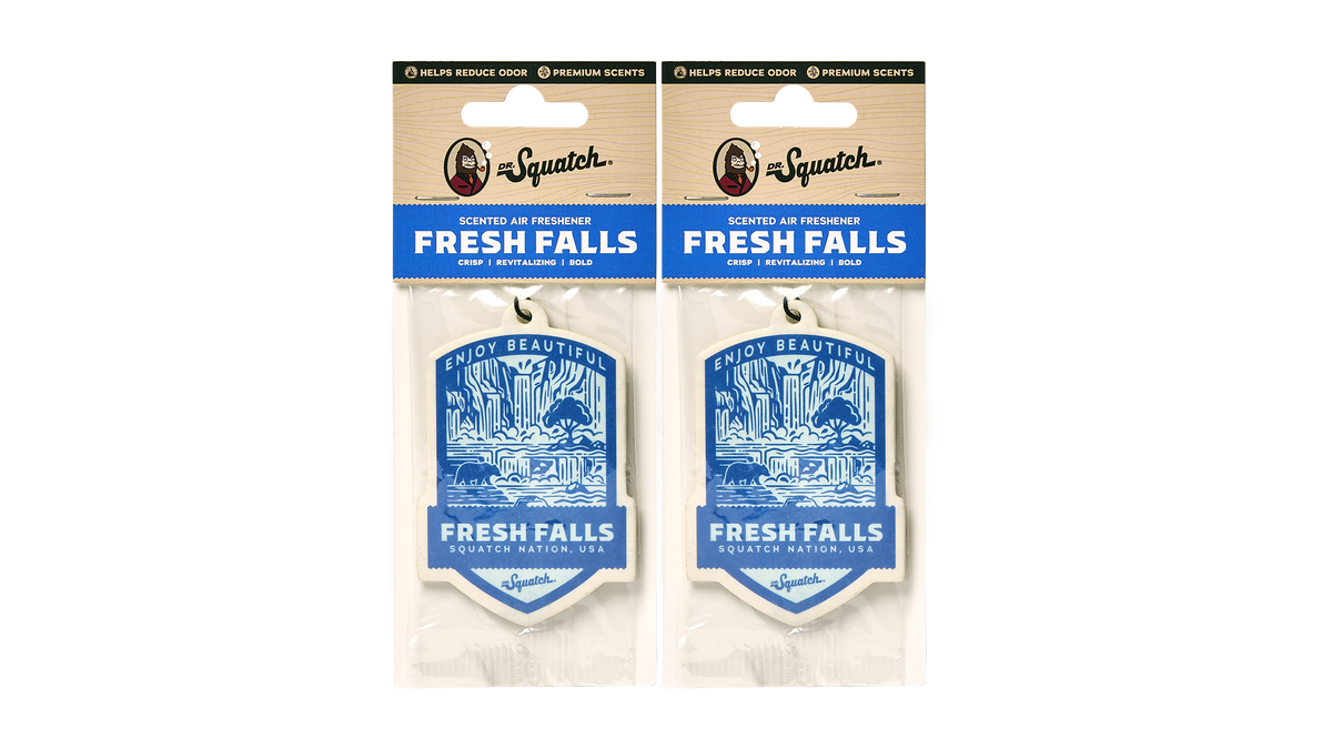 Two Dr. Squatch Fresh Falls scented air fresheners with blue waterfall designs on cream-colored hanging tags.