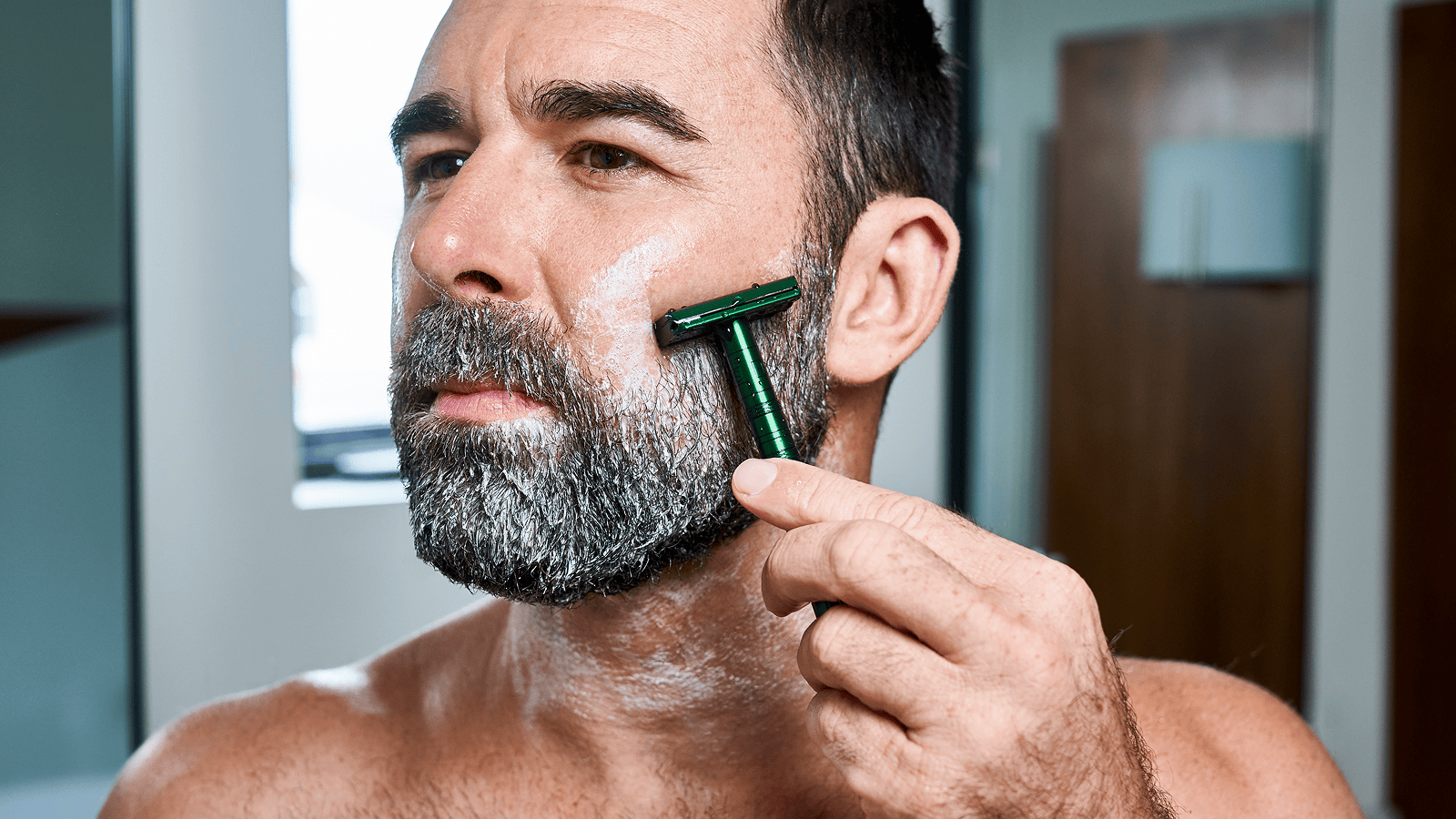 Lifestyle photo featuring Dr. Squatch Coconut Castaway Glide Guy Bundle gift set