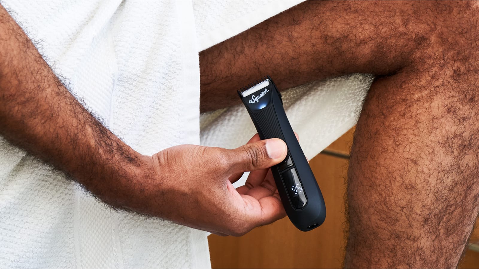 Promotional graphic for Dr. Squatch Black Electric Trimmer