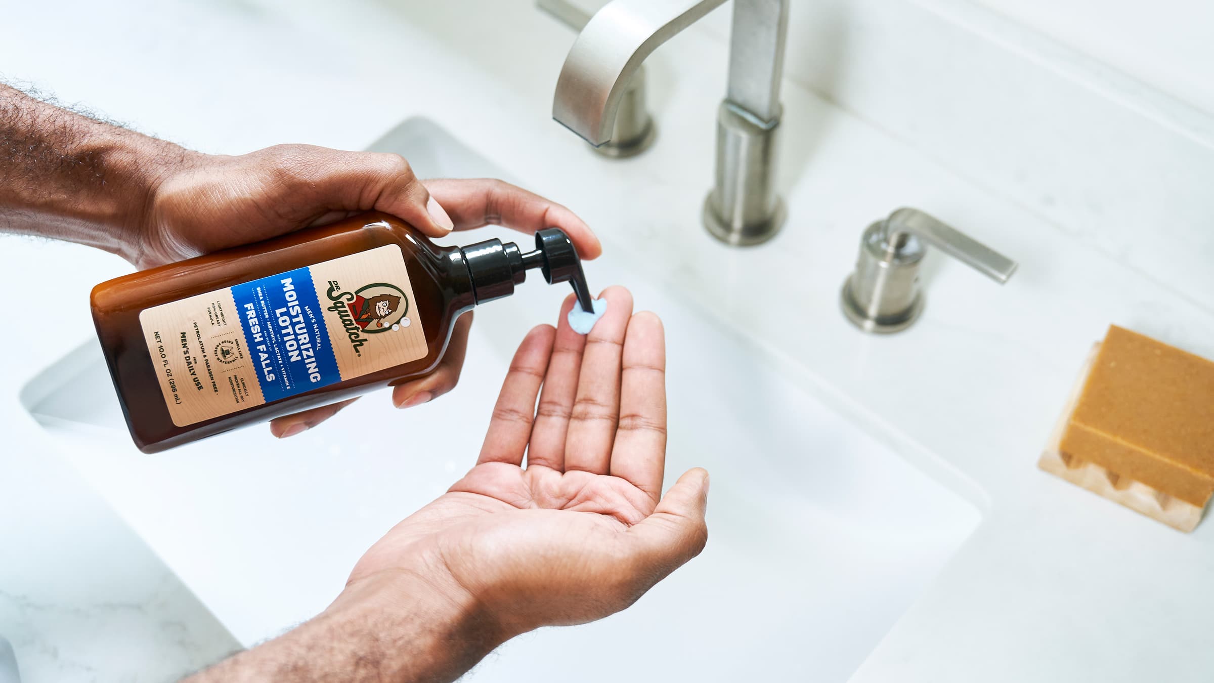 Dr. Squatch Fresh Falls Lotion being used